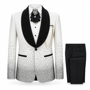 White blazer with embellished black shawl lapel, scattered dark embellishments and black-trimmed welt pockets